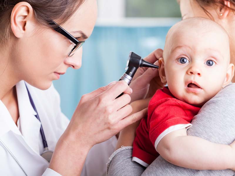 Baby getting ears checked