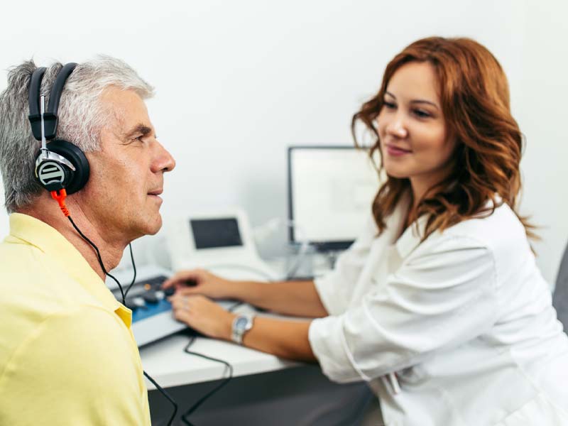 Man having a hearing loss test